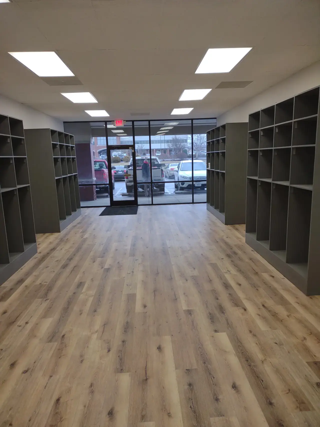 Commercial retail space with custom shelving and new flooring