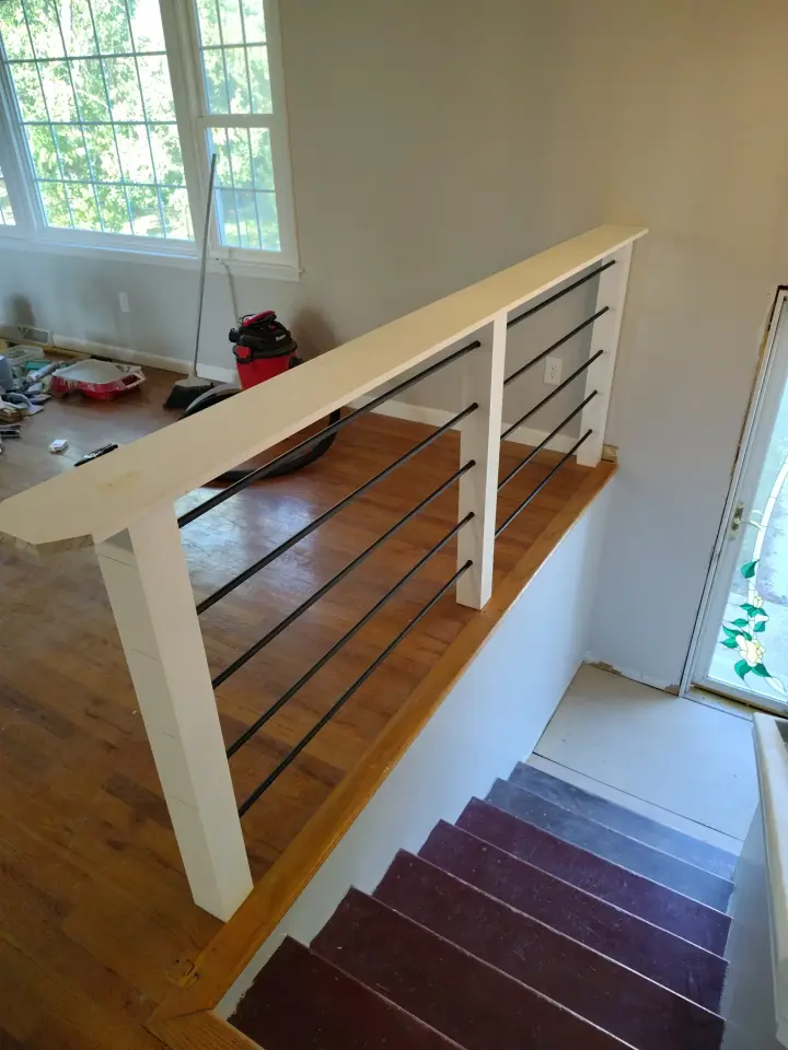 Exterior & Additional Details: Stair railing with metal balusters